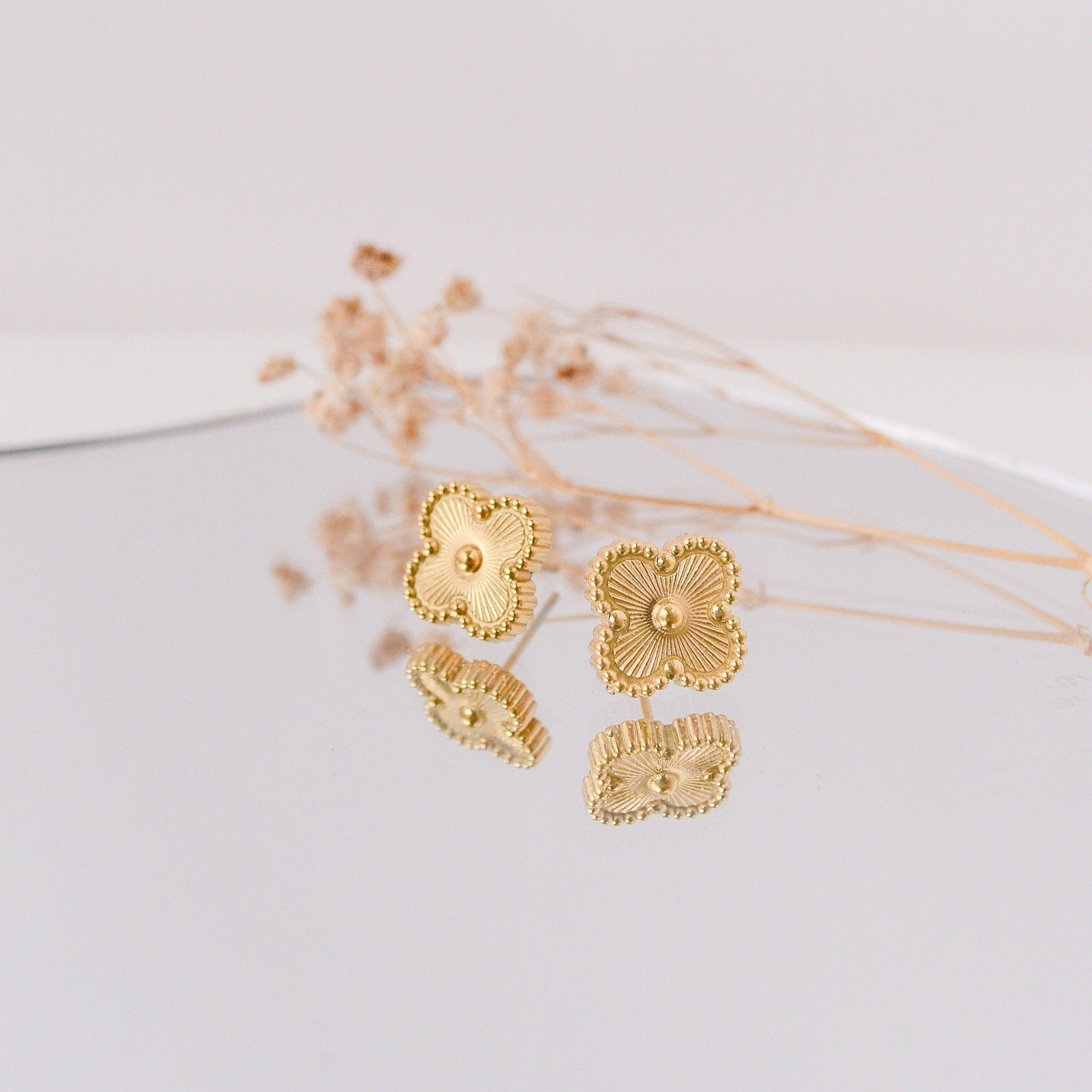lucky studs earrings for women
