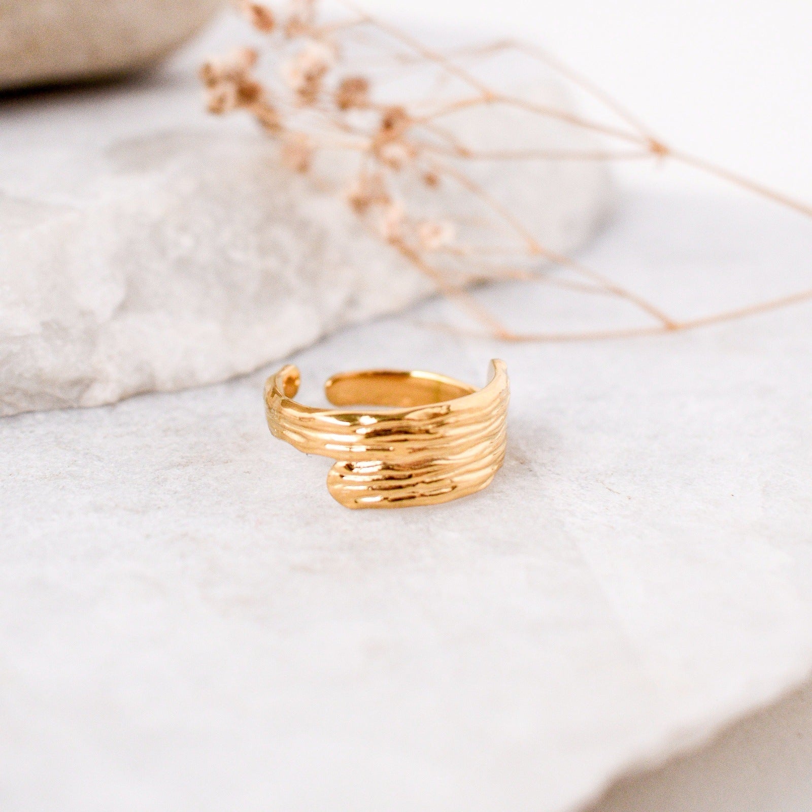 sunlit gold ring woman