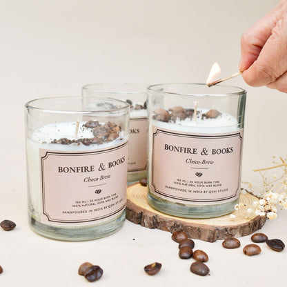 books and bonfire scented jar candles