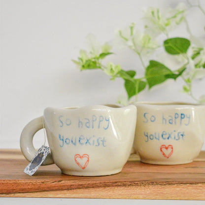 happy ceramic tea cups