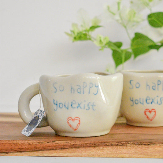 happy ceramic tea cups