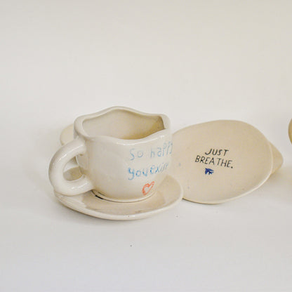 happy ceramic tea cups