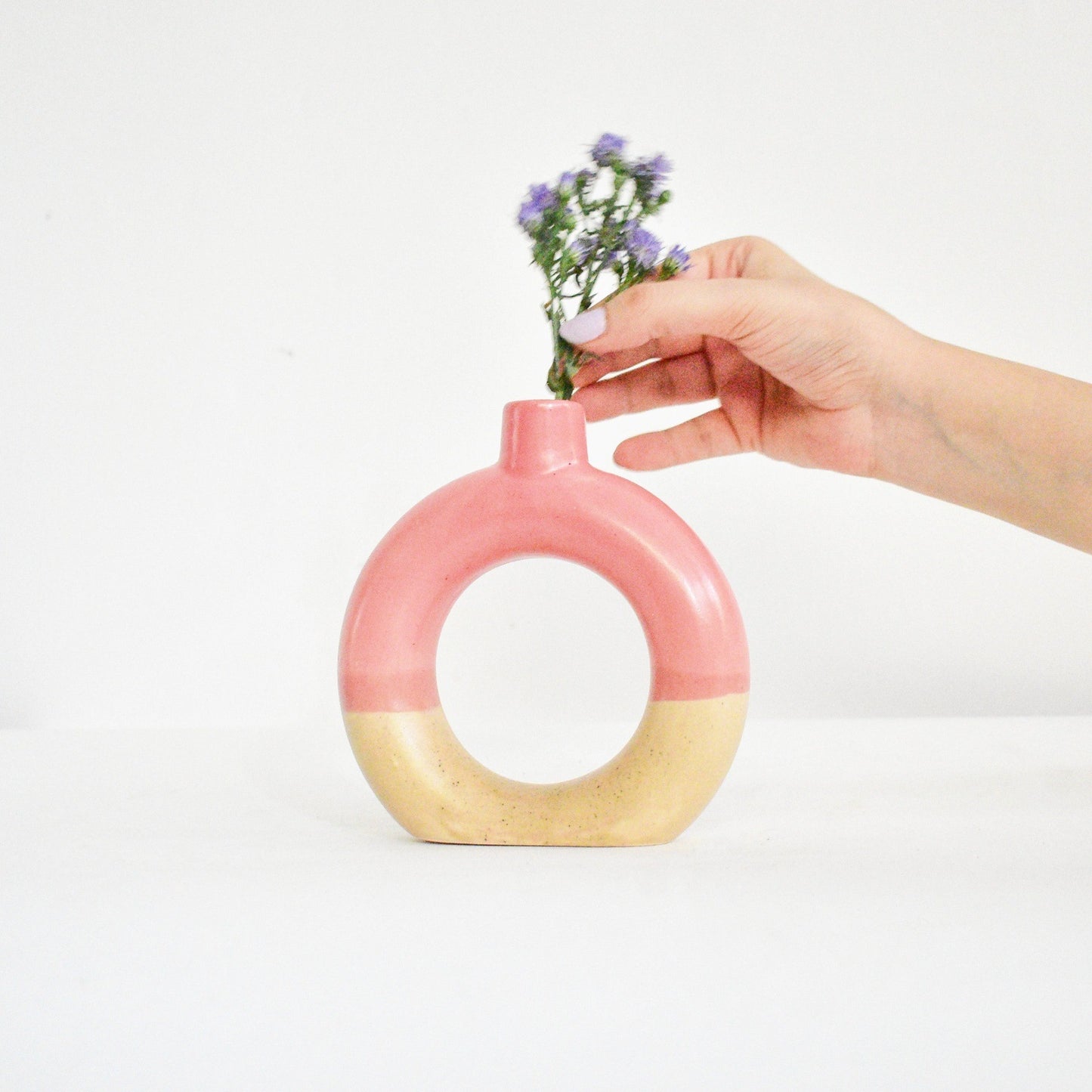 pink decorative ceramic donut vase