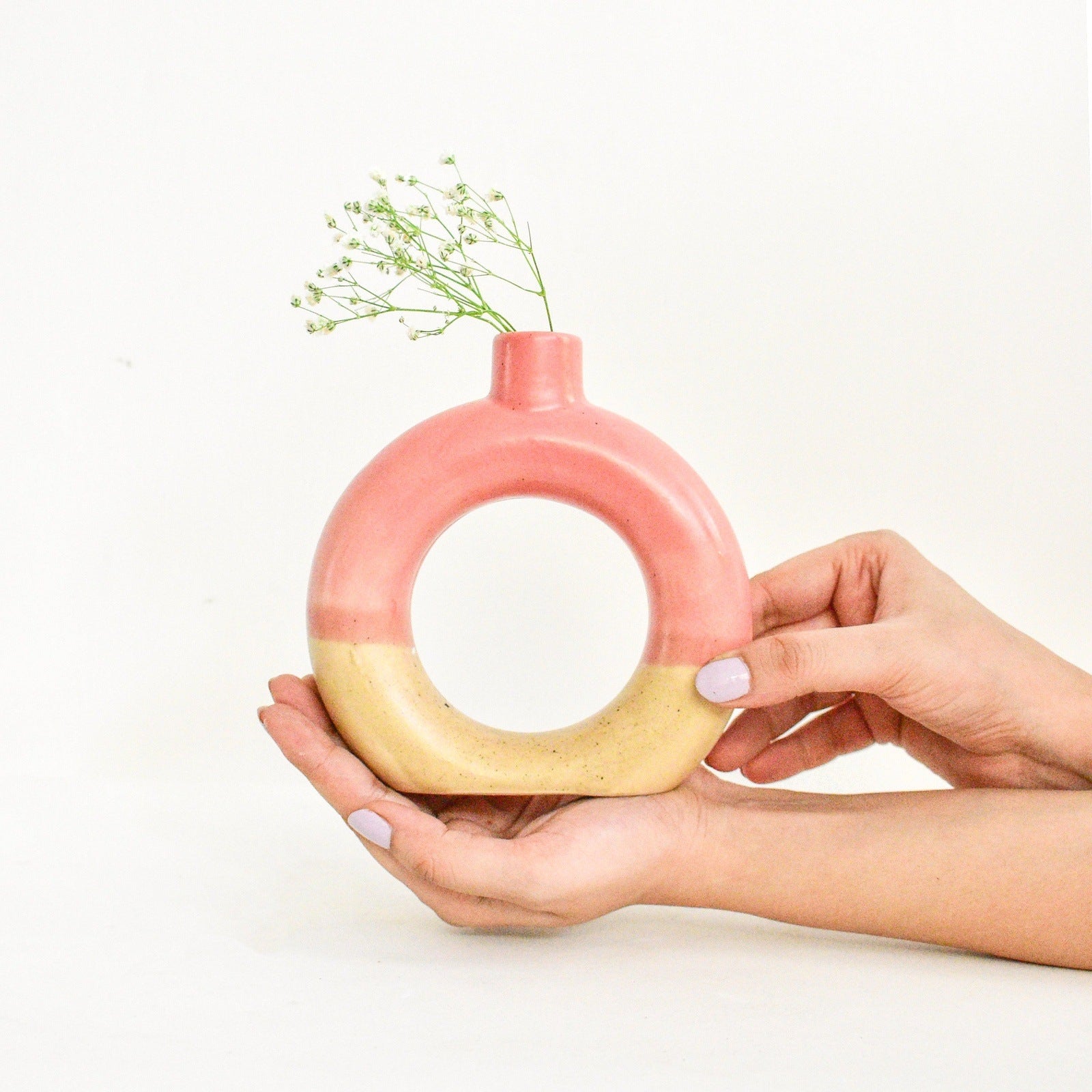 pink decorative ceramic donut vase